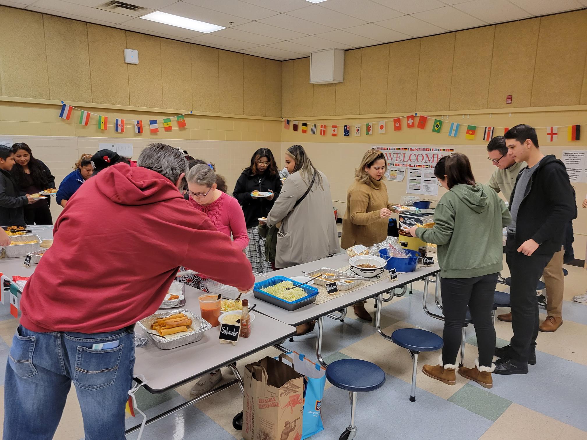 Students, staff, and families enjoy our Culture Night Potluck