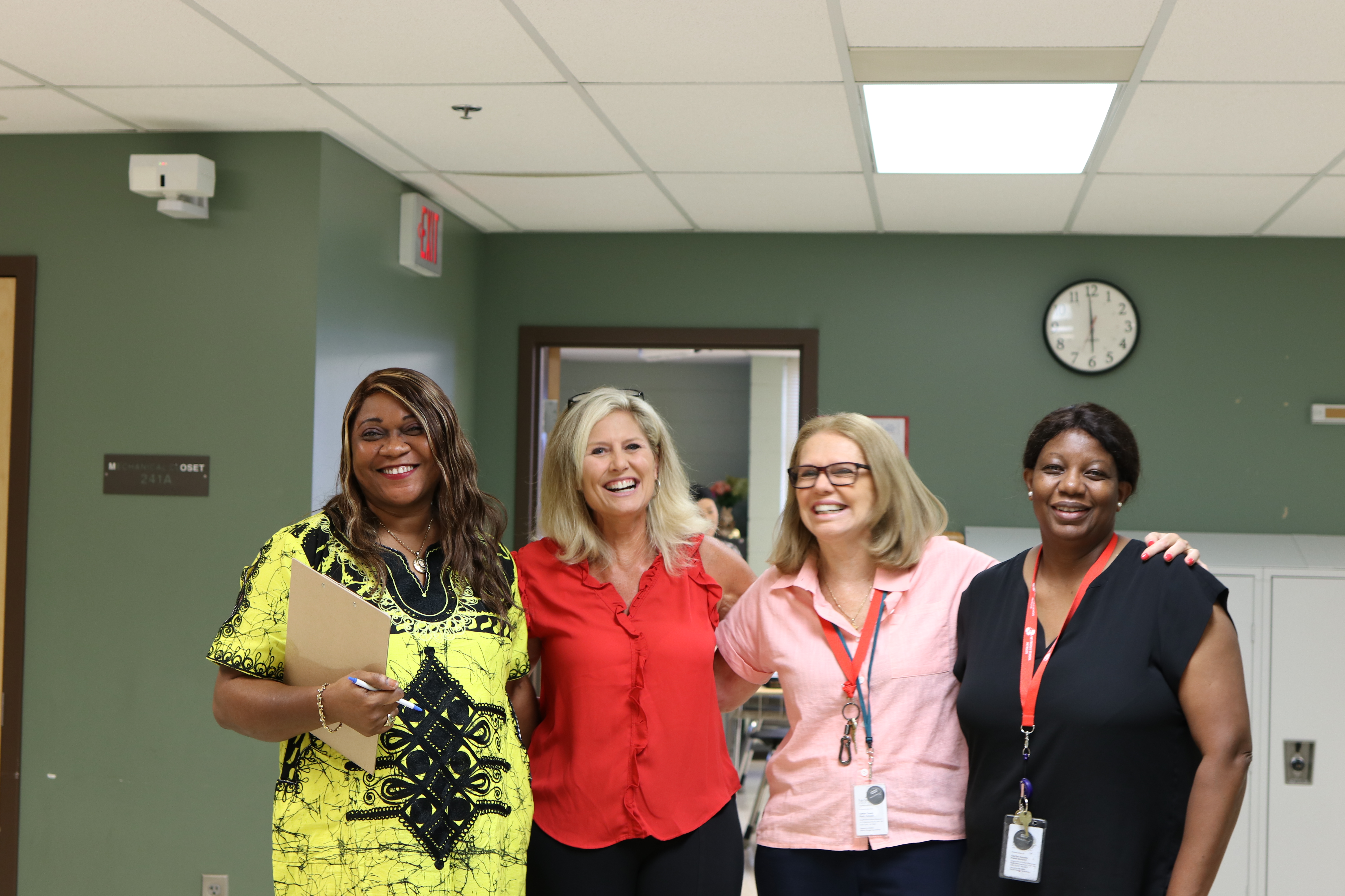 Group of 4 women smiling